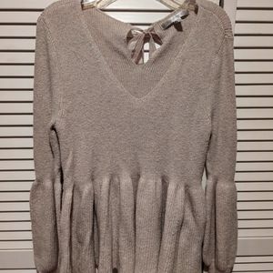 Peplum sweater with bow keyhole back